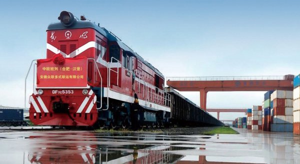 A parked train ready to load some containers for predictable goods delivery